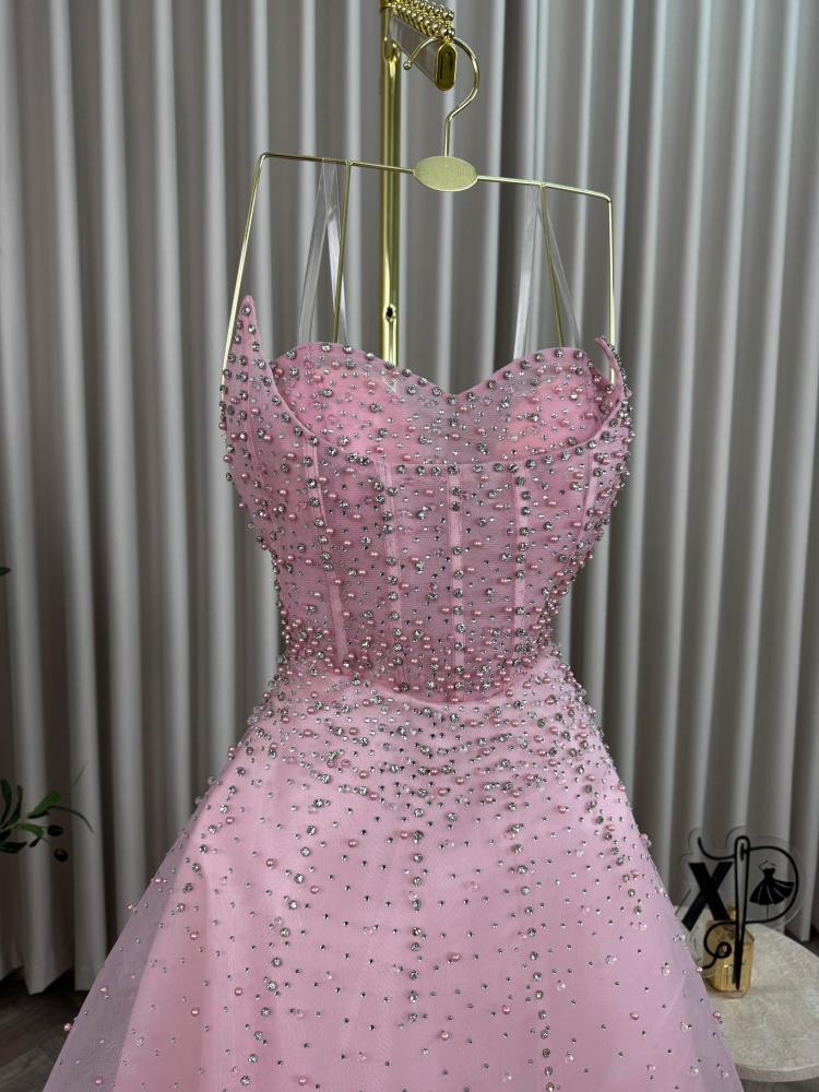 Long evening dress made of tulle in pink with hand embroidery