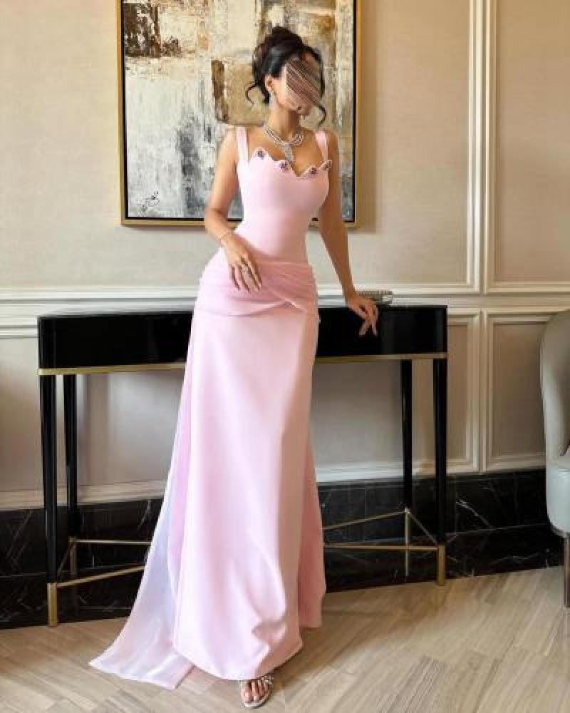 Long pink evening dress decorated with crystal with a back train