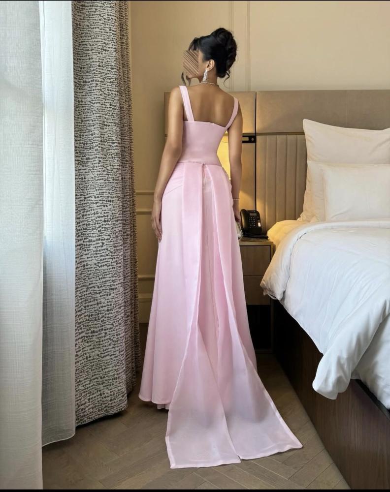 Long pink evening dress decorated with crystal with a back train