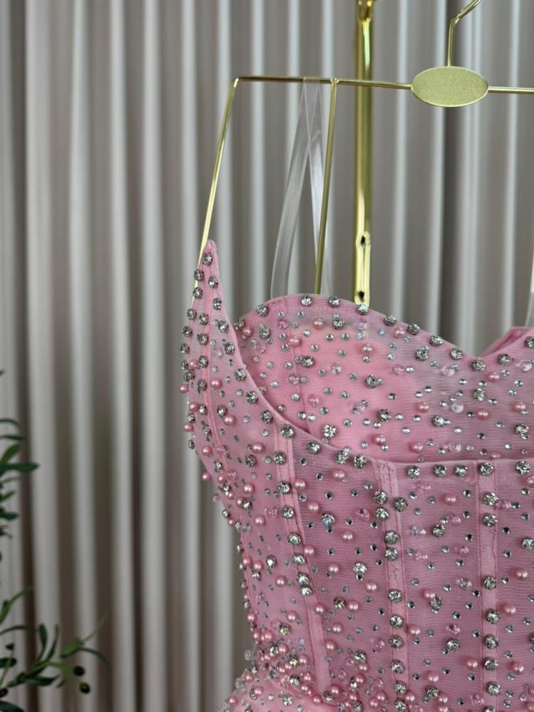 Long evening dress made of tulle in pink with hand embroidery