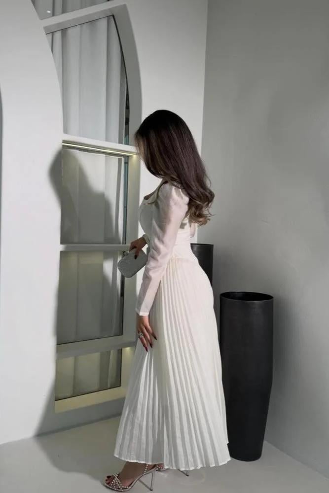 فستان أبيض لينين مع جازار لمعه