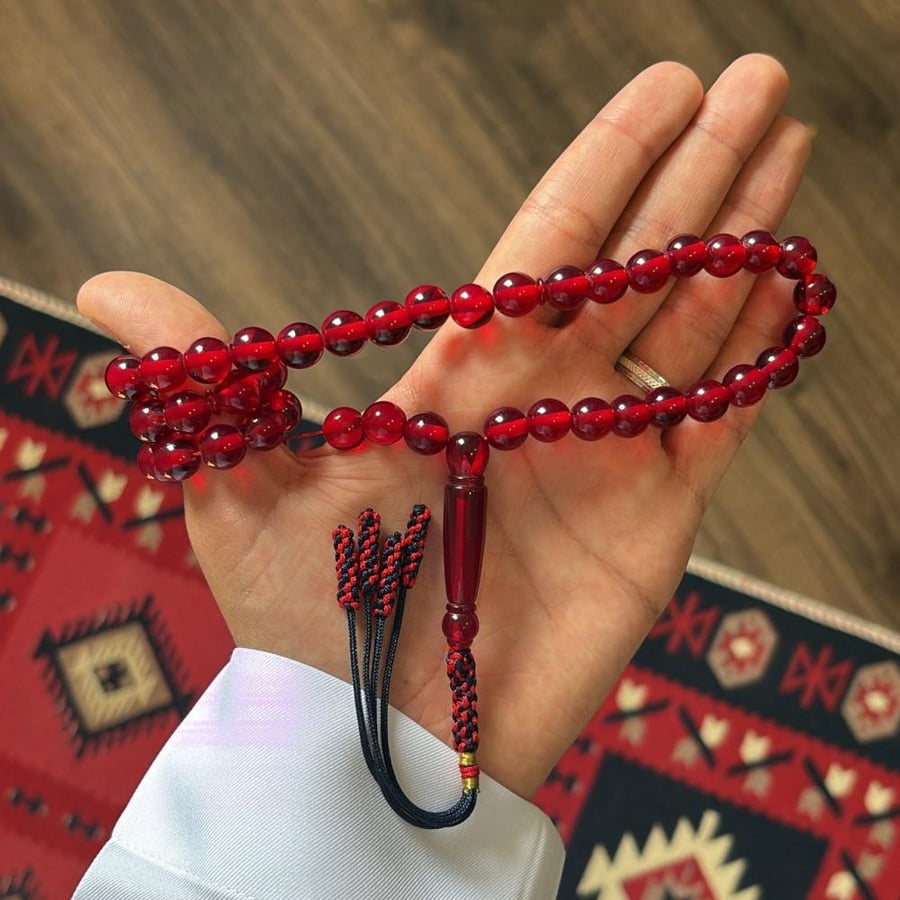 مسباح بكلايت بلون احمر شفاف
