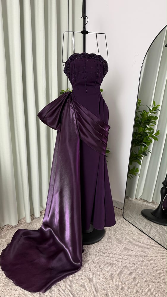 Lama's purple dress