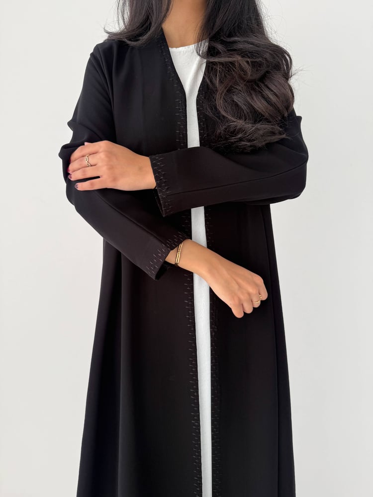 Rooted | Made of authentic Japanese crepe fabric, black, with embroidery on the collar and sleeves