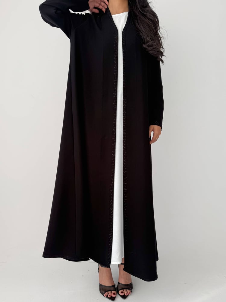 Rooted | Made of authentic Japanese crepe fabric, black, with embroidery on the collar and sleeves