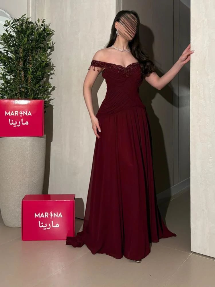 فستان رينيه  (فستان برغندي صدريه تطريز يدوي وجورجيت دبل كلوش)