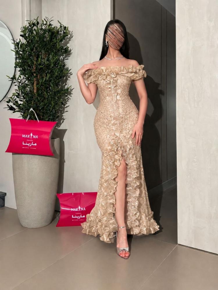 فستان امارا (فستان ذهبي فاتح كلفه شك سهره راقيه كركشه بوليسيه)