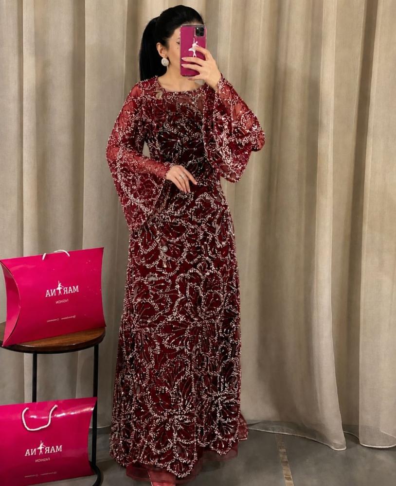 فستان ماجده عودي (فستان عودي شك سهره بطانه تفته)
