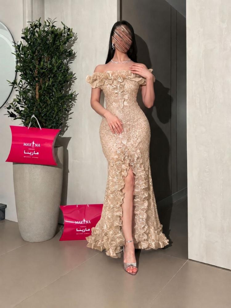 فستان امارا (فستان ذهبي فاتح كلفه شك سهره راقيه كركشه بوليسيه)