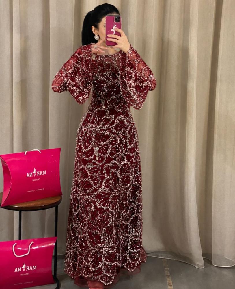 فستان ماجده عودي (فستان عودي شك سهره بطانه تفته)