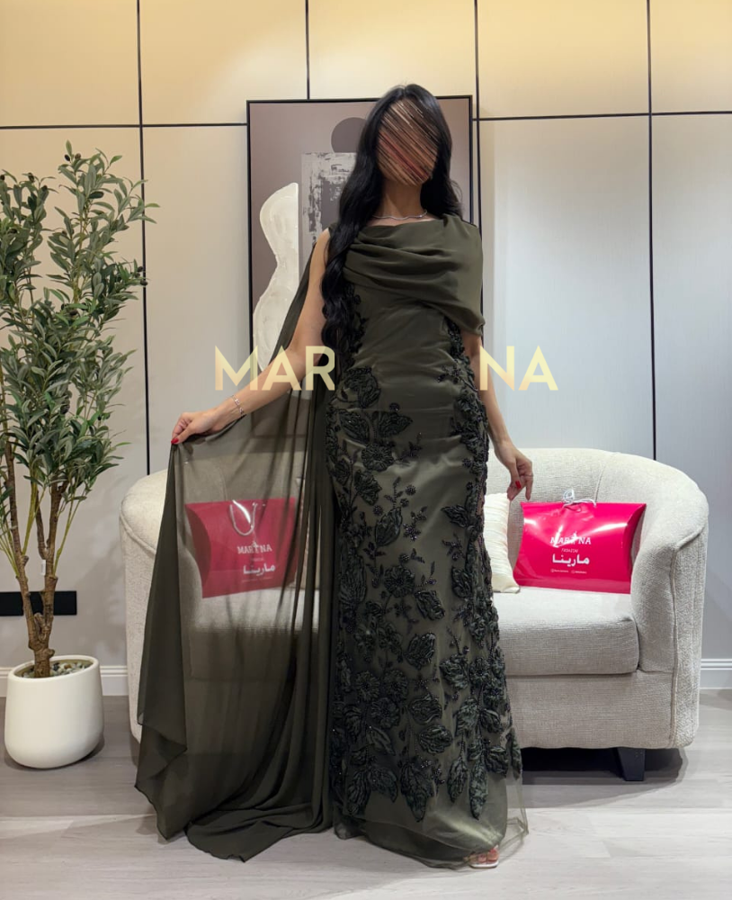 Moura's dress (an olive-green dress with beading and a shawl beside a georgette)