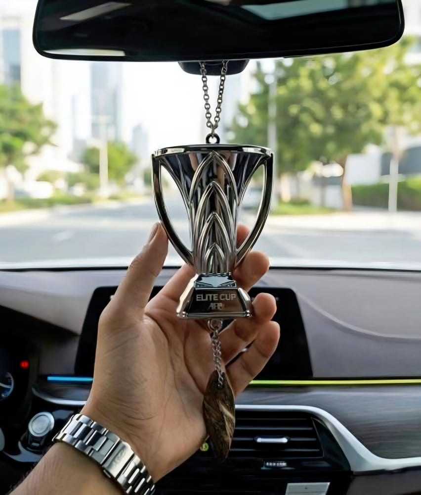 A decoration in the shape of a glass of the elite