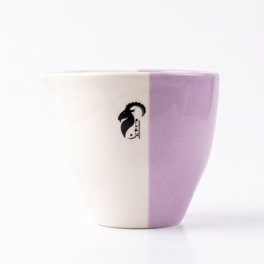 2 way cup - أثر