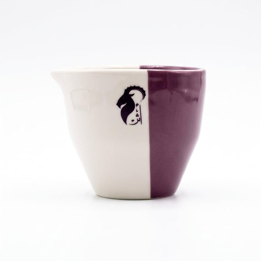 2 way cup - أثر