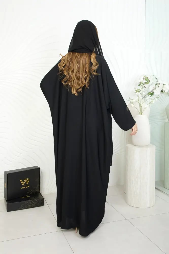 عباية نص بشت سادة كم عادي