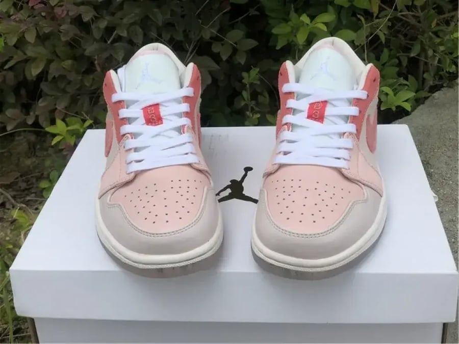 Air Jordan 1 low the mighty swooshers pink