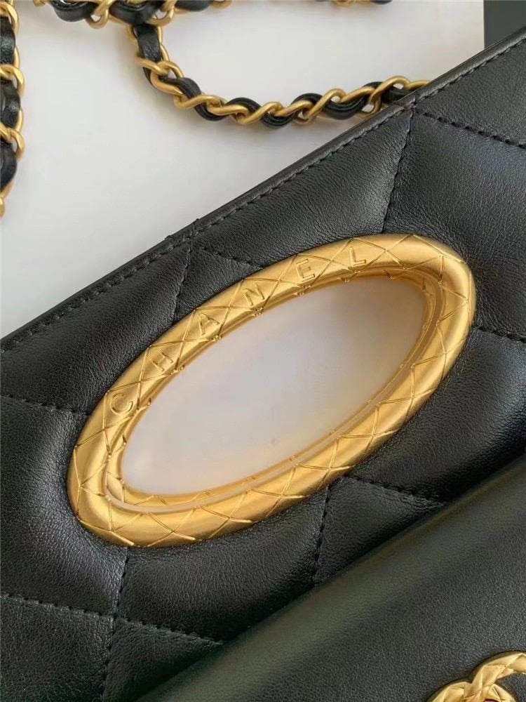 Chanel Clutch Lambskin Gold Tone Metal