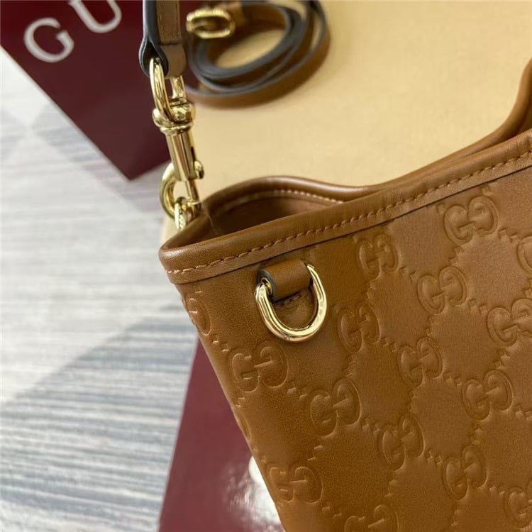 GUCCI GG Emblem Mini Bucket Bag