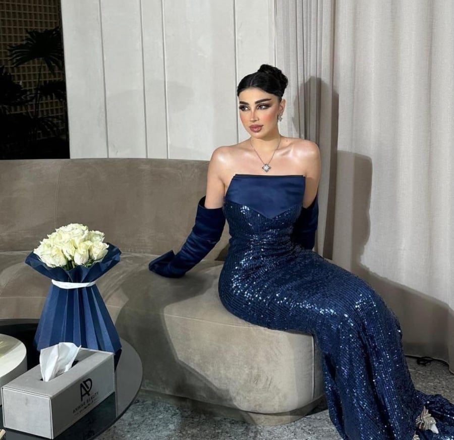 Navy blue sequin dress with a top style and separate sleeves