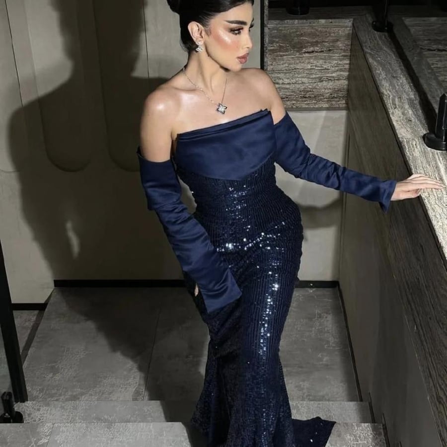 Navy blue sequin dress with a top style and separate sleeves
