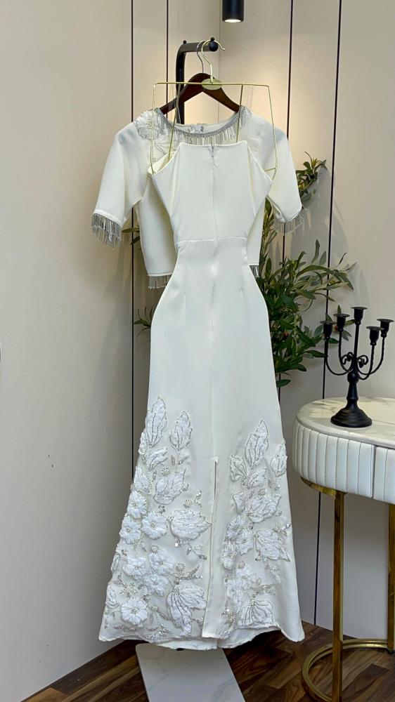 Elegant feminine set consisting of a dress, top, and blouse