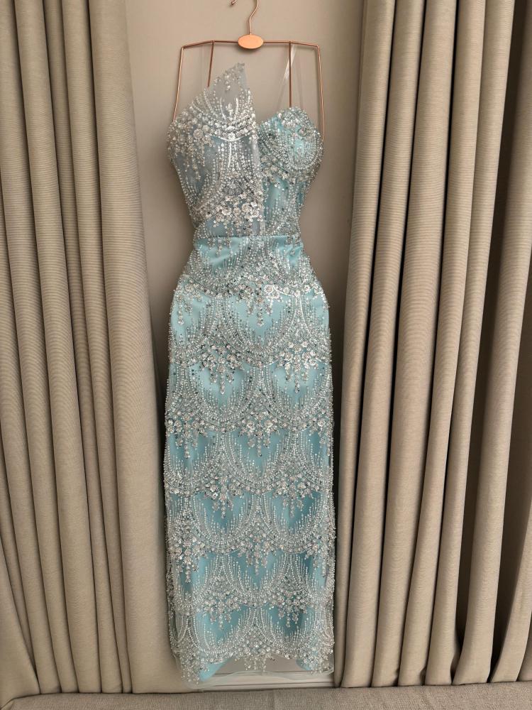 Evening dress decorated with dense embroidery of beads and sequins available for immediate delivery. Jeddah-Makkah delivers within two hours, and Riyadh-Al Taif-Al Madinah and other areas deliver within 24 hours only.