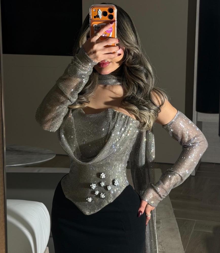 A corset top and a black skirt