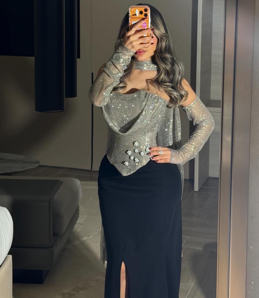 A corset top and a black skirt