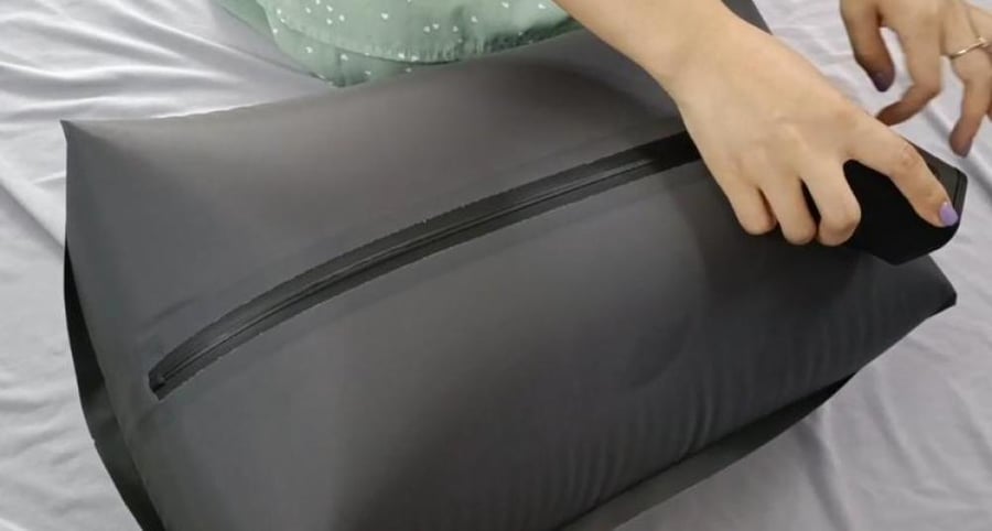 Travel bag with suction feature