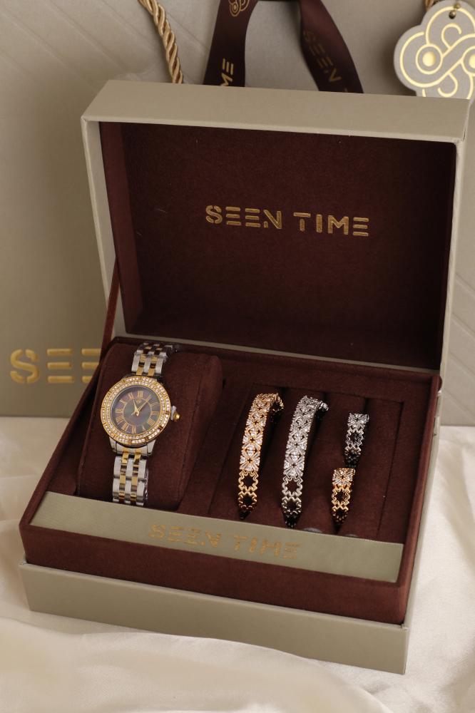 طقم ساعة نسائية SEEN TIME دائرية لونين بميناء أسود بألوان الطيف