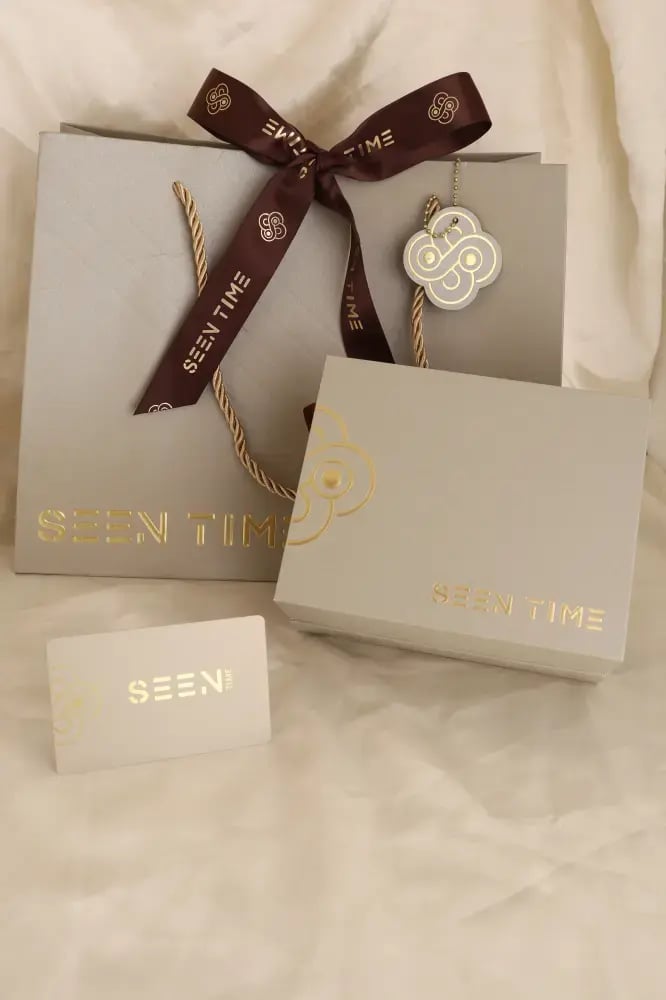 طقم ساعة نسائية SEEN TIME دائرية ذهبي بميناء رمادي