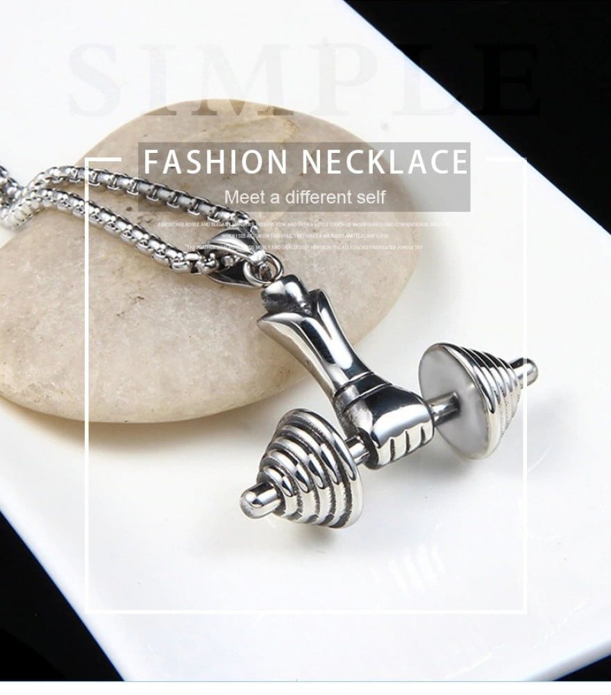 Necklace with pendant in the shape of a hand holding dumbbells, silver color