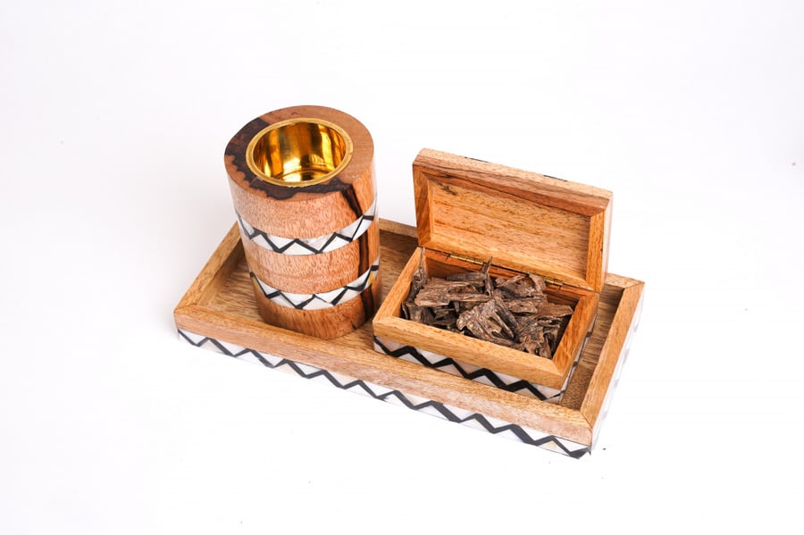 A box for storing oud and an incense burner with a wooden holder and modern engraving
