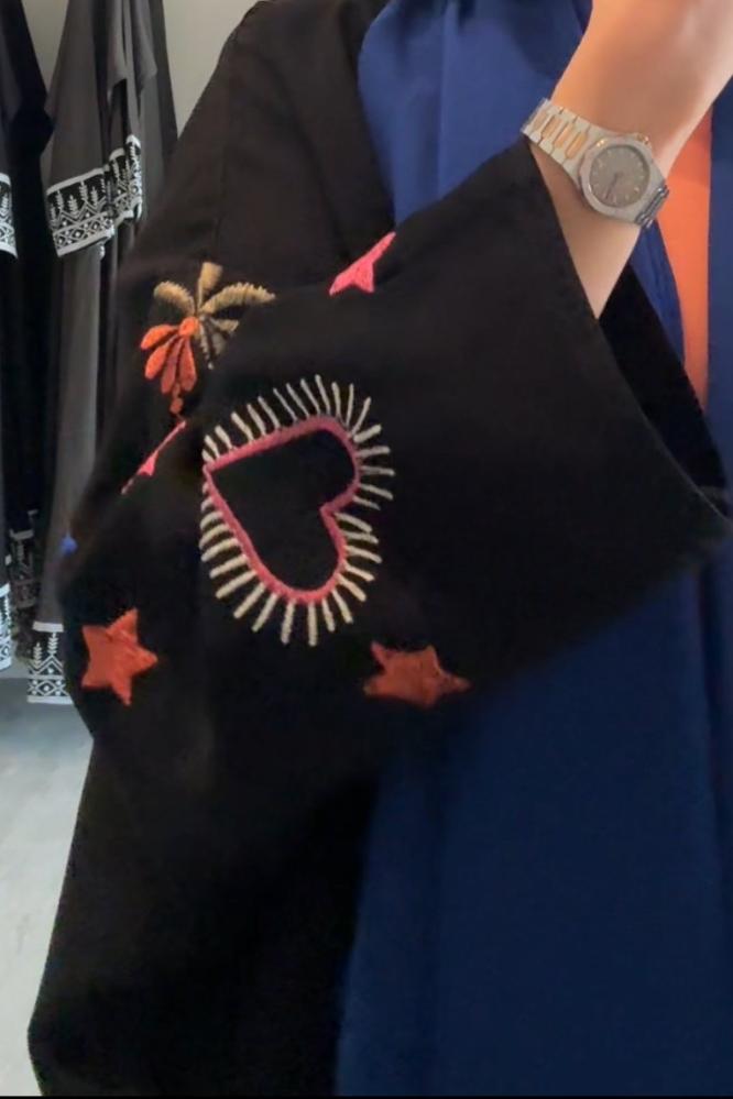 Blue eye Abaya - عباءة العين الزرقاء