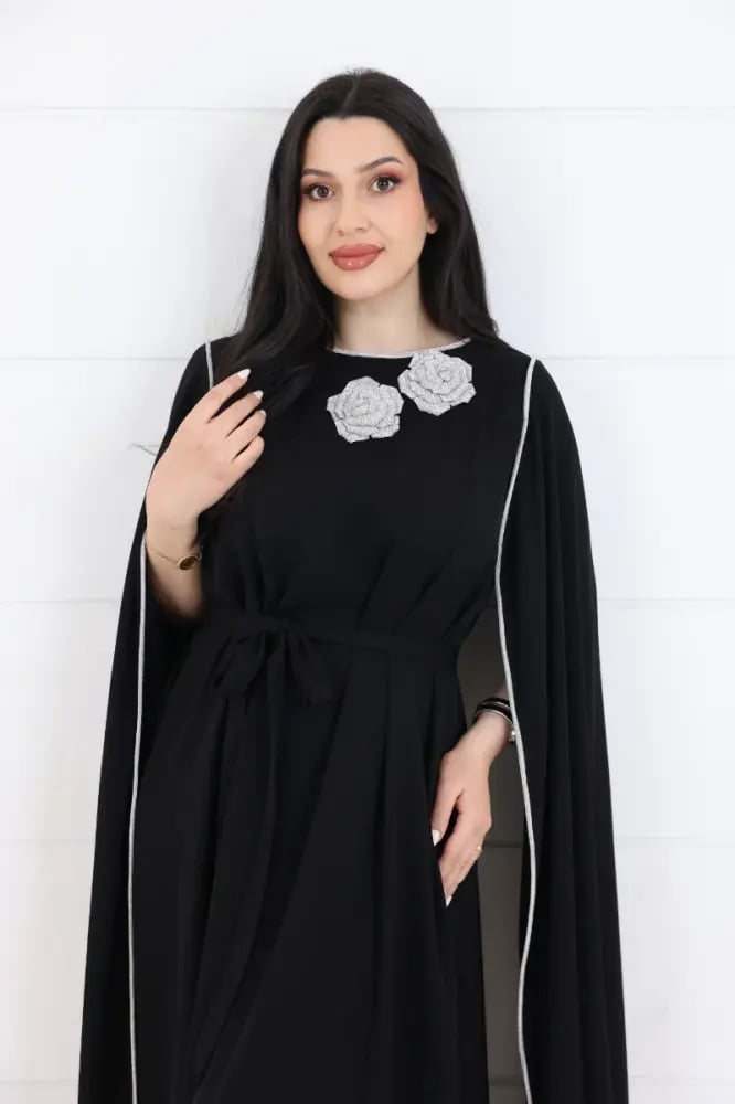 Stretch crepe dress black color long sleeves open decorated with pink silver trim