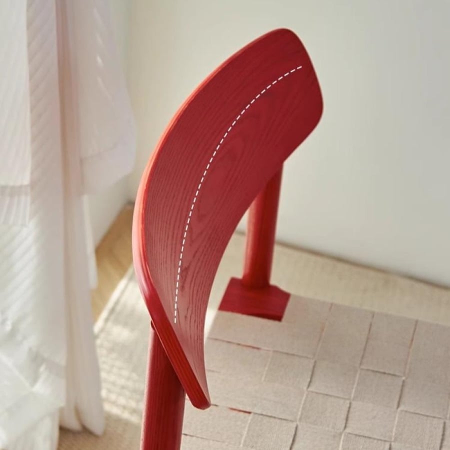 A solid wooden dining chair woven with ropes