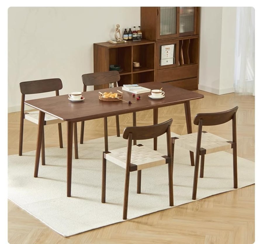 A solid wooden dining chair woven with ropes