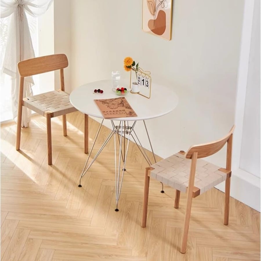 A solid wooden dining chair woven with ropes