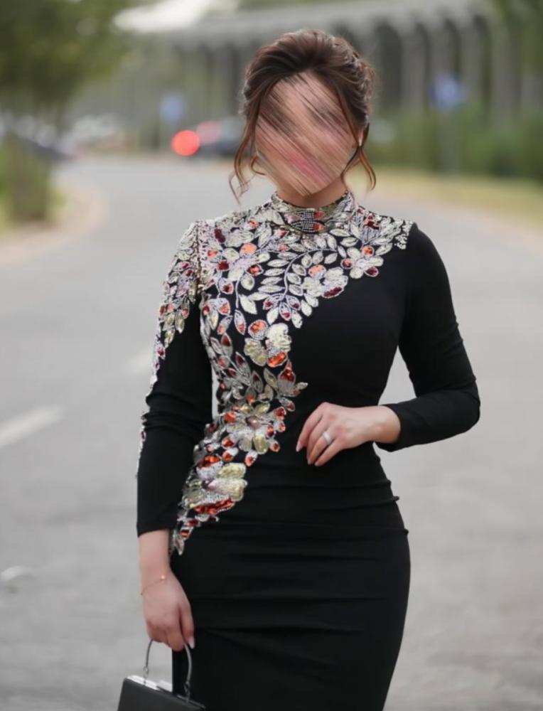 Narah. The material is Barbie embroidery on the same fabric.