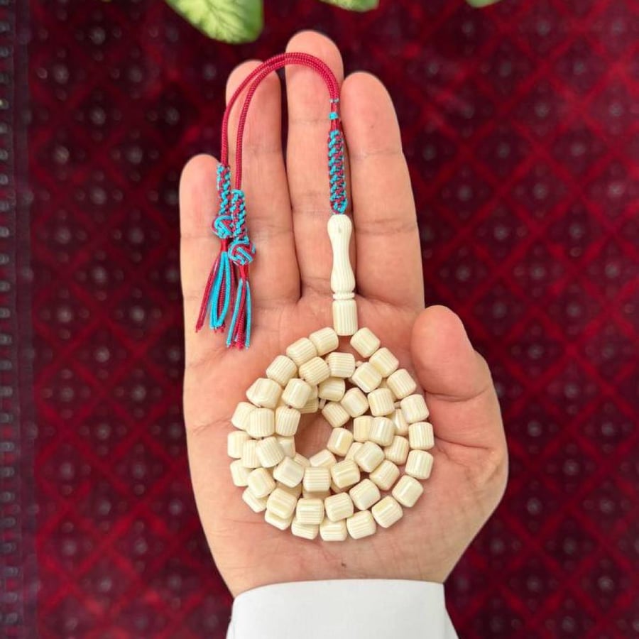 A prayer bead with a clasp
