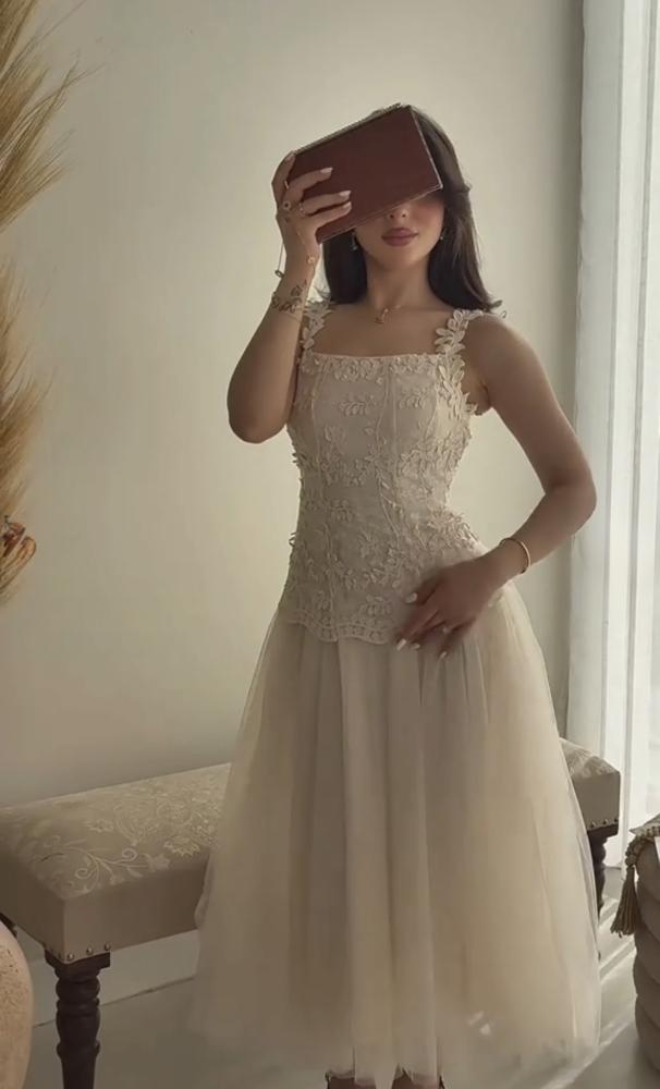 Elegant evening dress with soft tulle