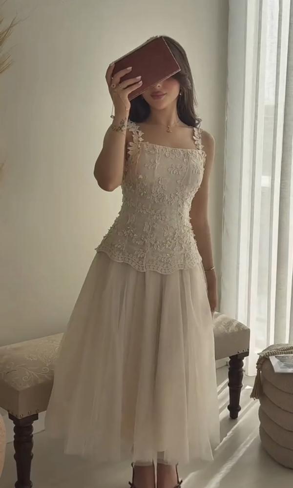 Elegant evening dress with soft tulle