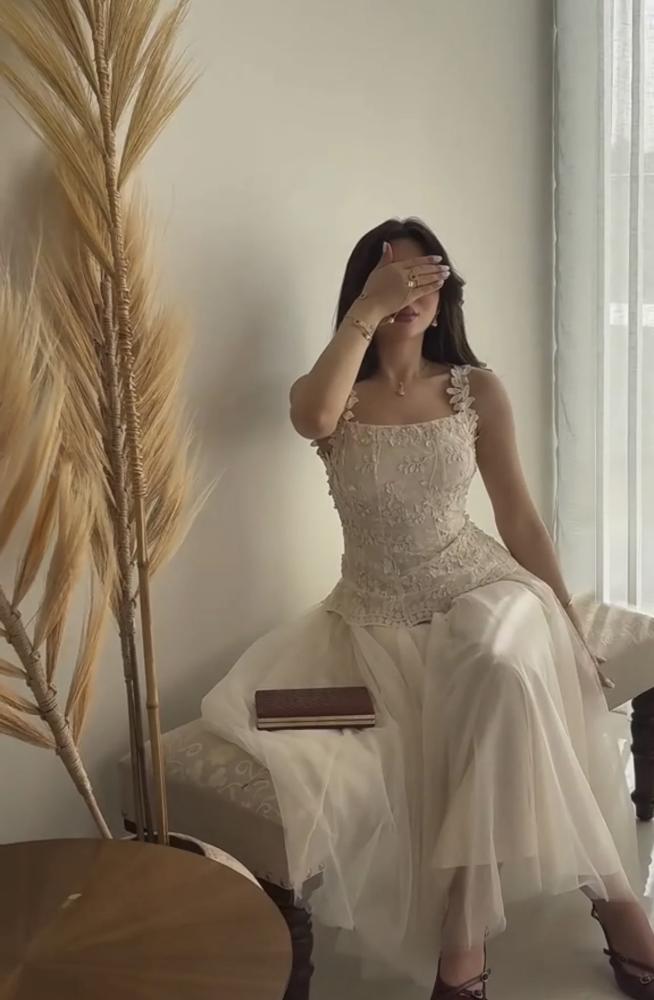 Elegant evening dress with soft tulle