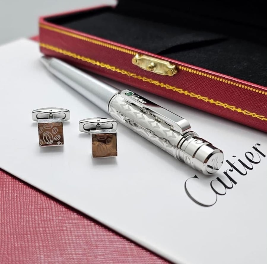 A men's pen and cufflink set, Cartier brand