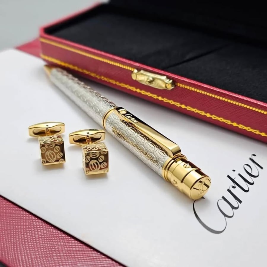 A men's pen and cufflink set, Cartier brand