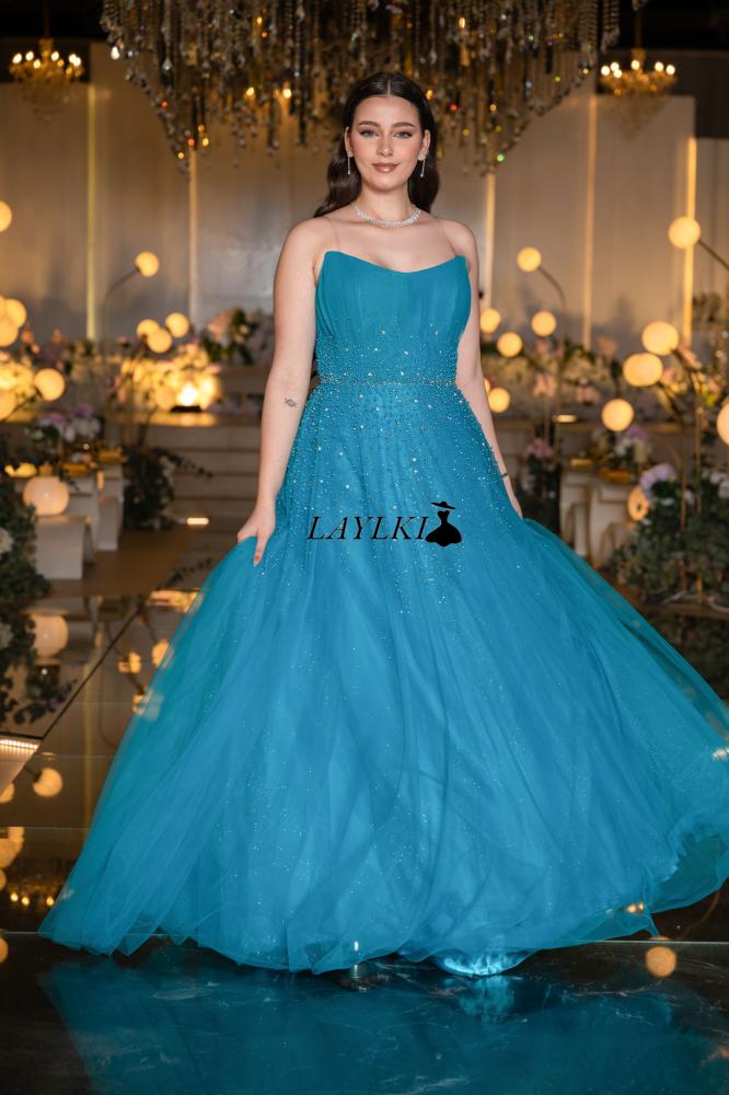 Turquoise dress with shiny embroidery and luxurious flow