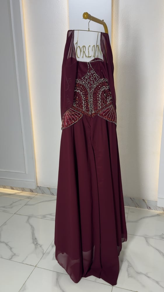 فستان سماوي بكورسيه مطرزه يدوي كرستال