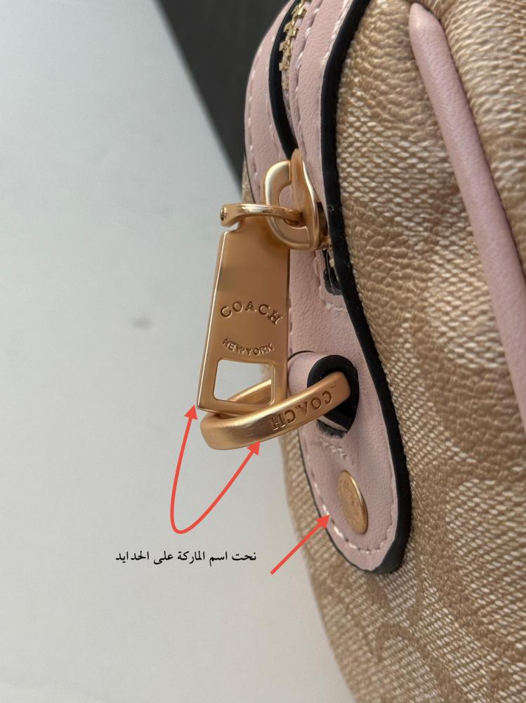حقيبة كوتش روان بيج أطراف وردي