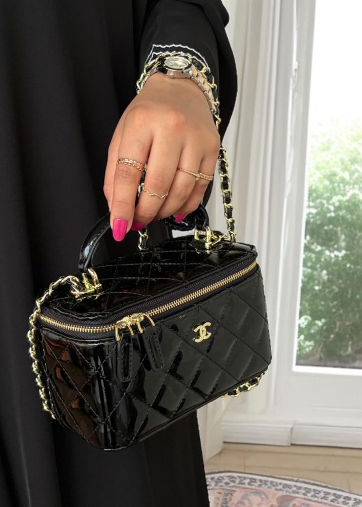 Chanel makeup bag, shiny black