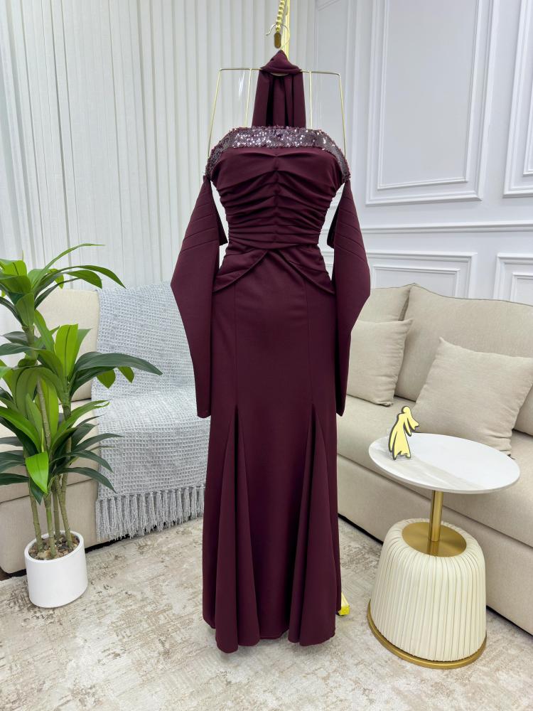 Elegant evening dress in burgundy color, sophisticated, luxurious, made of Barbie fabric